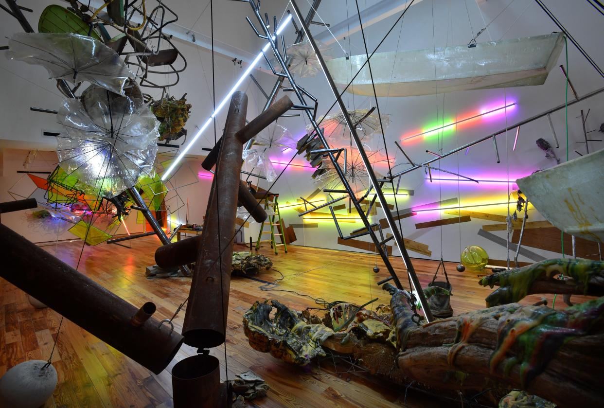 Judy Pfaff's installation at the Sarasota Art Museum of Ringling College of Art and Design is titled: Picking up the Pieces. Half the exhibit recognizes the natural beauty and abundance of Florida. The site-specific half of the installation, pictured, is a result of Pfaff's exploration of Fort Myers Beach and Sanibel Island following Hurricane Ian.