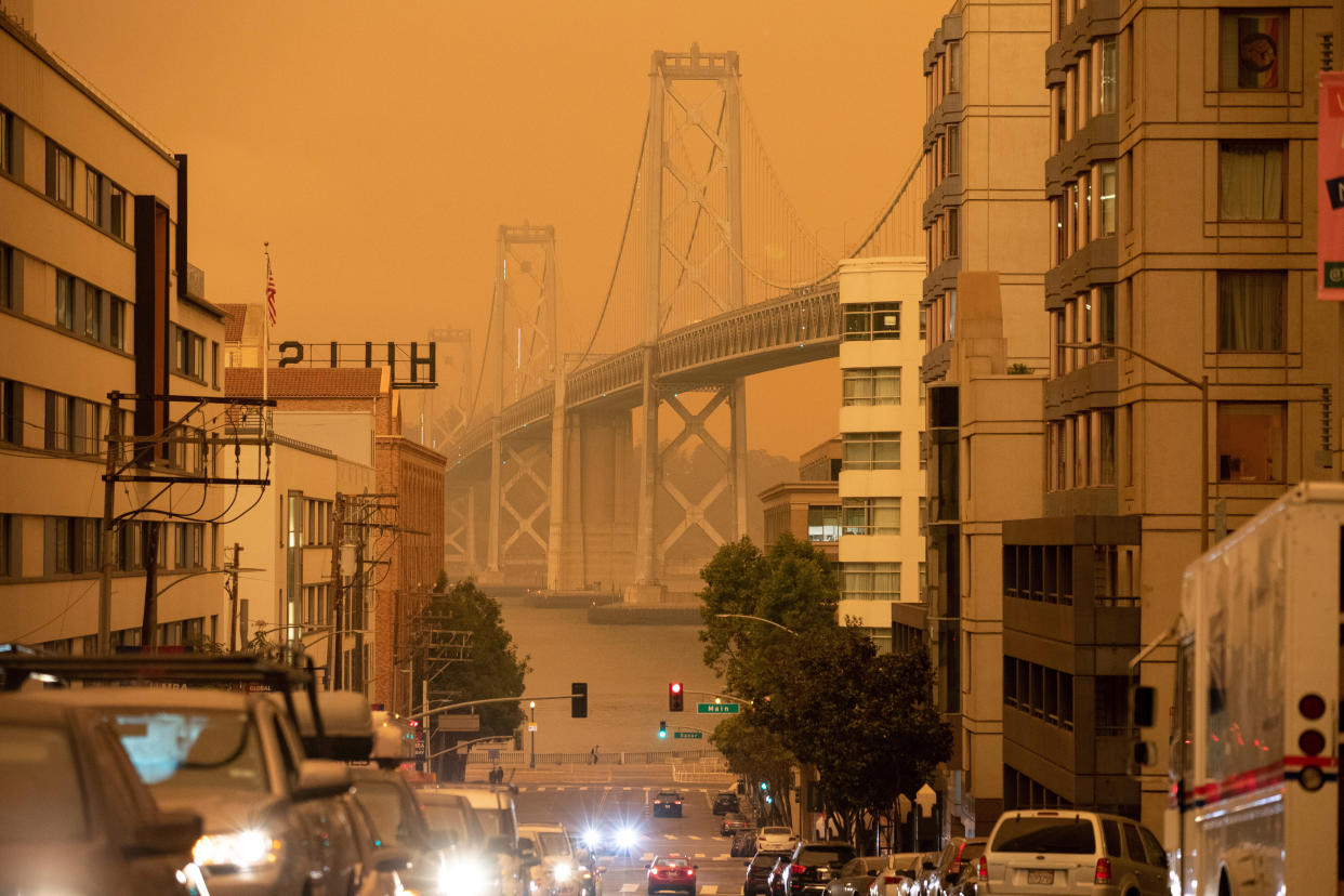 The Bay Bridge in San Francisco is seen under an orange sky darkened by the smoke from California wildfires on Sept. 9, 2020. (Photo: Stephen Lam / Reuters)