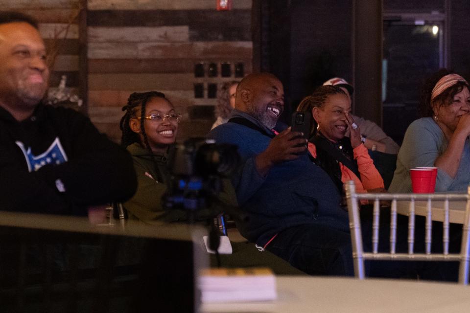 Family members of JaWon Wheat laugh as the Topeka comedian talks about a bit involving his dad's truck during his set at Thursday's comedy competition at The Foundry.