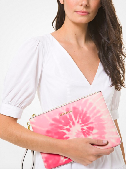 Michael Kors large tie-dye zip pouch, S$199. PHOTO: Michael Kors