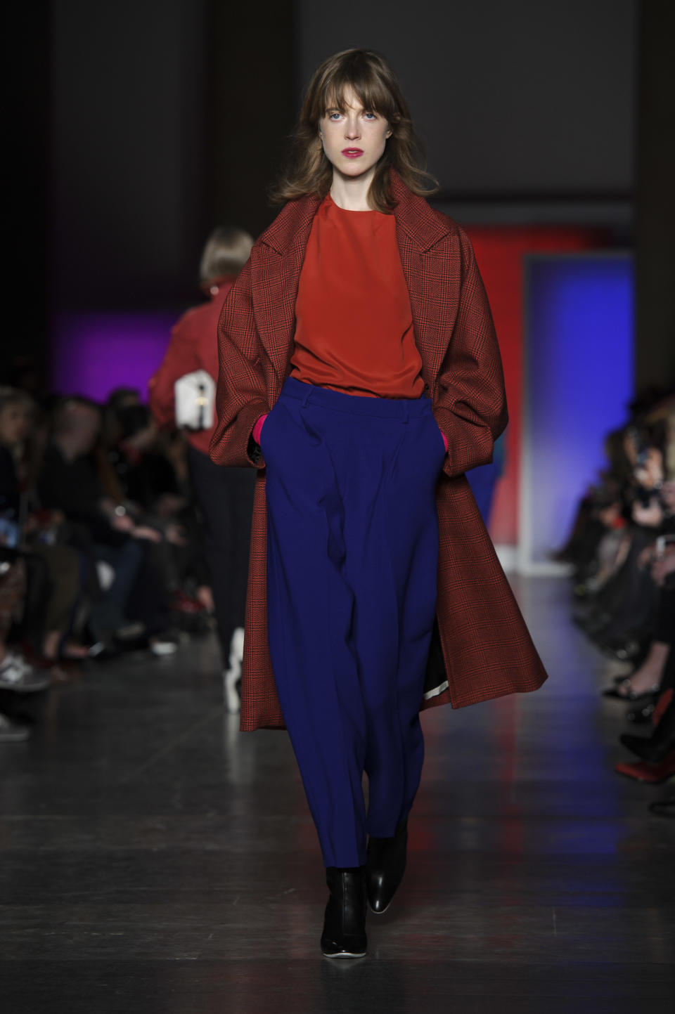 A model wears a design from the Paul Smith collection during London Fashion Week, Sunday, Feb. 17, 2013, London. (Photo by Jonathan Short/Invision/AP)