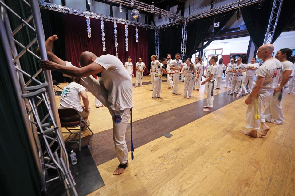 Students prepare for a capoeira class at Trolley Square in Salt Lake City on Friday, April 28, 2023. | Scott G Winterton, Deseret News