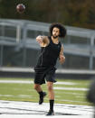 Free agent quarterback Colin Kaepernick participates in a workout for NFL football scouts and media, Saturday, Nov. 16, 2019, in Riverdale, Ga. (AP Photo/Todd Kirkland)