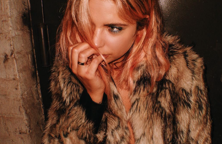 Ashley Benson is obsessed with her new fur coat, and so are we