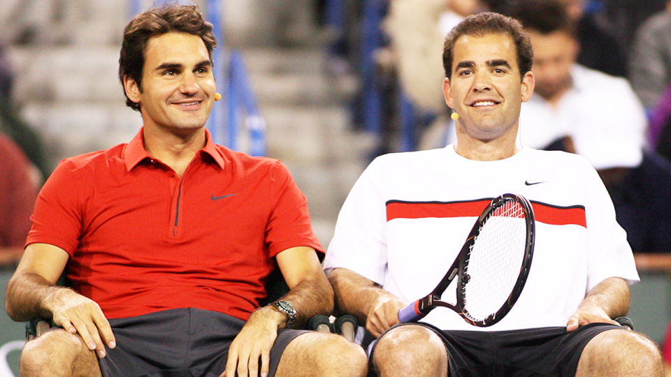 Pete Sampras (pictured right) shares a laugh with Roger Federer (pictured left) during an exhibition match.