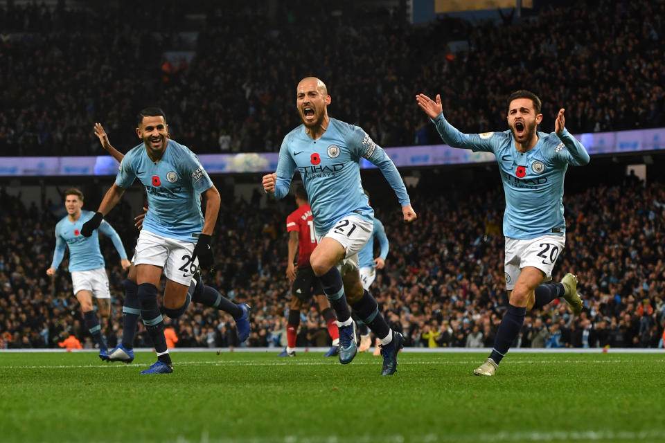 David Silva (centre) races away to celebrate after scoring Manchester City’s 12th-minute opener