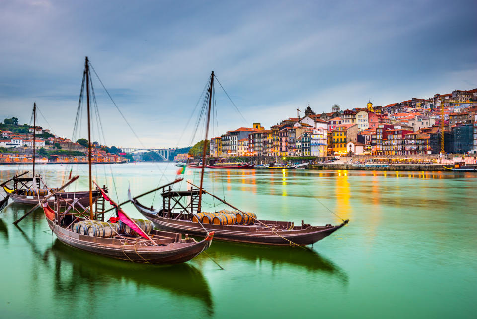 Porto, Portugal old town cityscape on the Douro River with traditional Rabelo boats. Photo: Getty