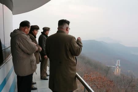 North Korean leader Kim Jong Un watched the ground jet test of a Korean-style high-thrust engine newly developed by the Academy of the National Defence Science in this undated picture provided by KCNA in Pyongyang on March 19, 2017. KCNA/via Reuters/Files