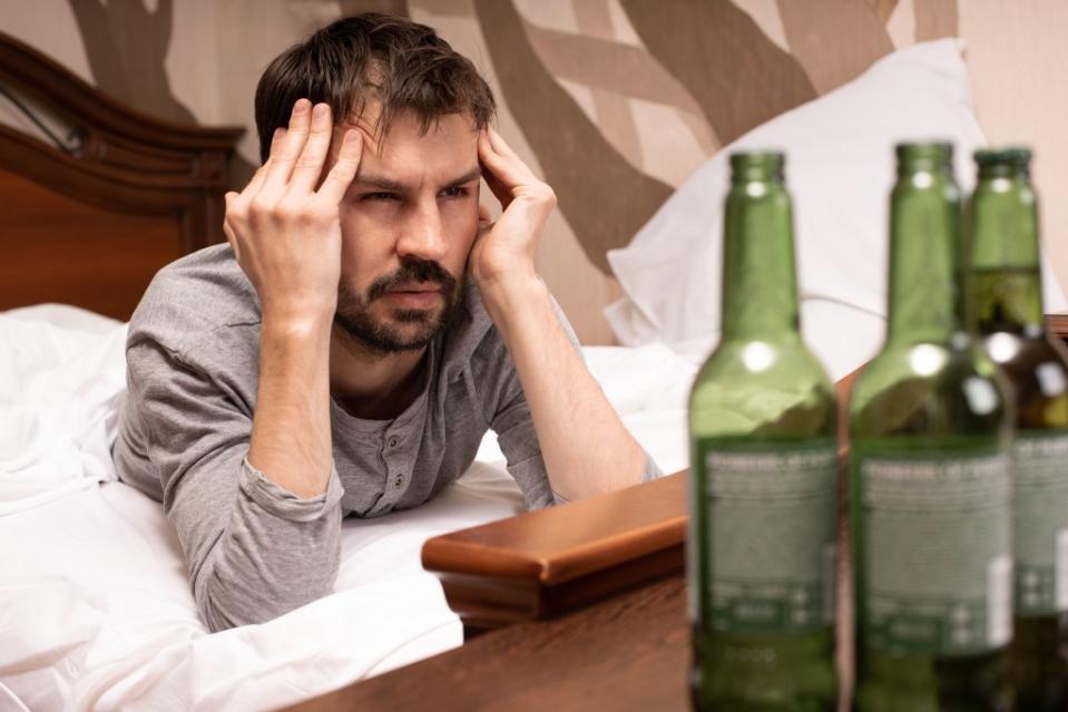 A brutal hangover or other symptoms after only one or two drinks could signal an intolerance to booze, according to experts. Stanislaw Mikulski – stock.adobe.com