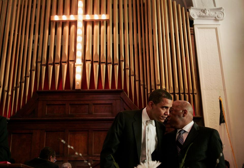 In this 2007 photo, Barack Obama, then a Democratic presidential candidate, spoke with Congressman John Lewis at a commemoration of the 1965 Voting Rights March at Brown Chapel AME Church in Selma, Alabama.
