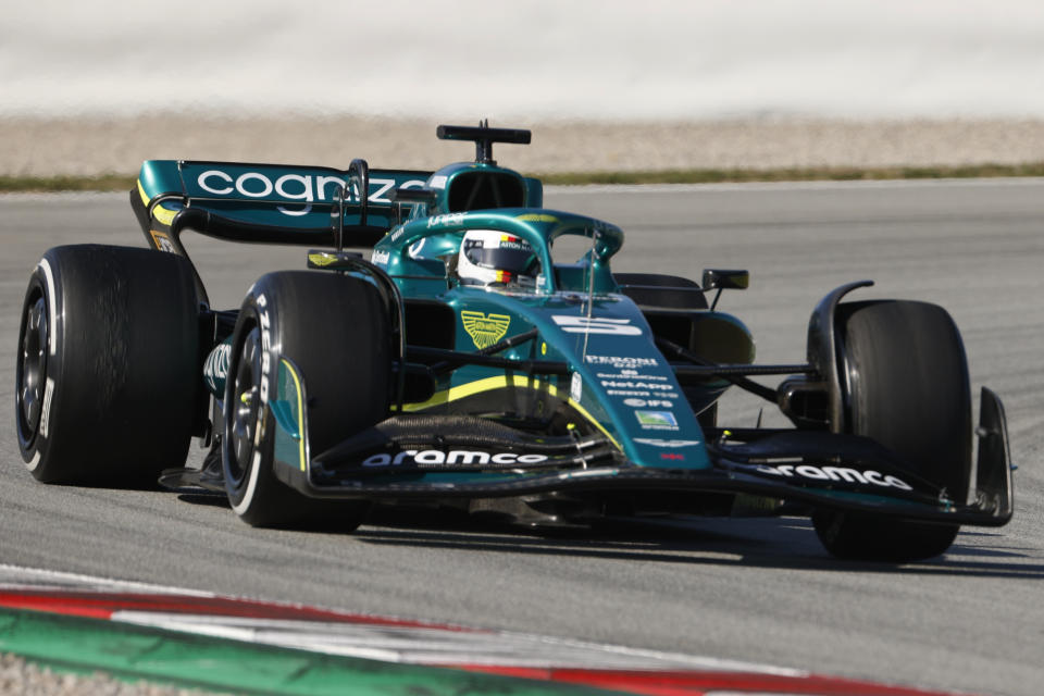 Aston Martin driver Sebastian Vettel of Germany steers his car during a Formula One pre-season testing session at the Catalunya racetrack in Montmelo, just outside of Barcelona, Spain, Wednesday, Feb. 23, 2022. (AP Photo/Joan Monfort)