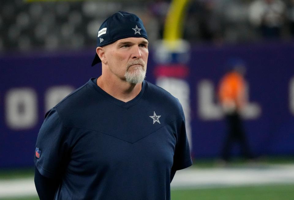 Cowboys defensive coordinator Dan Quinn walks on the field before a game at MetLife Stadium in East Rutherford, N.J., on Sept. 26, 2022.