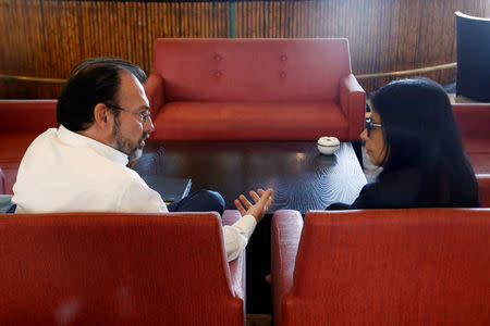 Mexican Foreign Minister Luis Videgaray (L), speaks to his Venezuelan counterpart Delcy Rodriguez during the Association of Caribbean States meeting in Havana, Cuba, March 10, 2017. REUTERS/Stringer