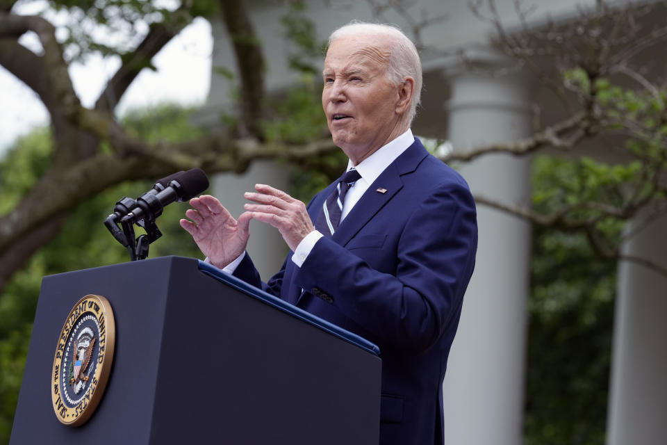 President Joe Biden speaks in the Rose Garden of the White House in Washington, Tuesday, May 14, 2024, announcing plans to impose major new tariffs on electric vehicles, semiconductors, solar equipment and medical supplies imported from China. (AP Photo/Susan Walsh)