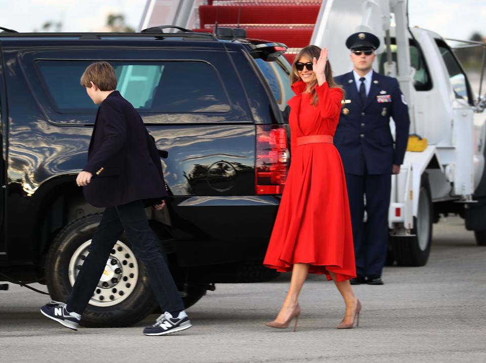 Photos: Getty. The First Lady pays homage to her predecessors in a coatdress.