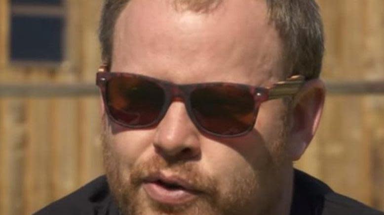 Shows Ross Parkhill with beard and sunglasses 