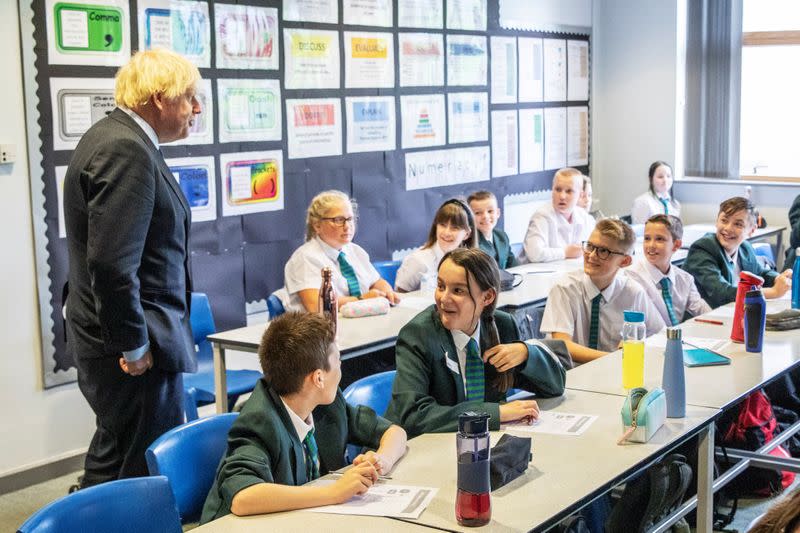 Britain's Prime Minister Boris Johnson visits Castle Rock school on the pupil's first day back to school, in Coalville