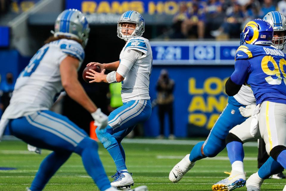 Detroit Lions quarterback Jared Goff (16) looks before making a pass against Los Angeles Rams during the second half at the SoFi Stadium in Inglewood, Calif. on Sunday, Oct. 24, 2021.