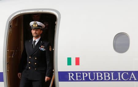 Italian sailor Salvatore Girone alights from the plane after landing at Ciampino airport in Rome, Italy, May 28, 2016. REUTERS/Alessandro Bianchi