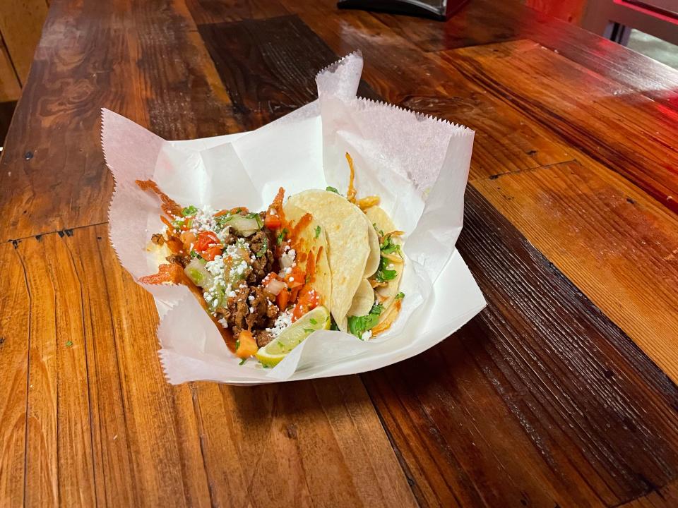 The steak and chorizo campechano taco and BBQ carnitas taco at the Funky Truckeria in Norton.