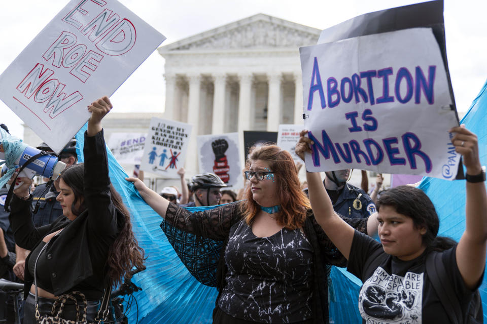 Anti-abortion protesters gather outside the Supreme Court in Washington, Friday, June 24, 2022. The Supreme Court has ended constitutional protections for abortion that had been in place nearly 50 years, a decision by its conservative majority to overturn the court's landmark abortion cases. (AP Photo/Jose Luis Magana)