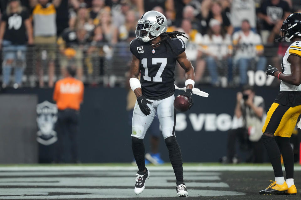 Sep 24, 2023; Paradise, Nevada, USA; Las Vegas Raiders wide receiver Davante Adams (17) reacts after catching a touchdown pass against the <a class="link " href="https://sports.yahoo.com/nfl/teams/pittsburgh/" data-i13n="sec:content-canvas;subsec:anchor_text;elm:context_link" data-ylk="slk:Pittsburgh Steelers;sec:content-canvas;subsec:anchor_text;elm:context_link;itc:0">Pittsburgh Steelers</a> in the first half at Allegiant Stadium. Mandatory Credit: Kirby Lee-USA TODAY Sports