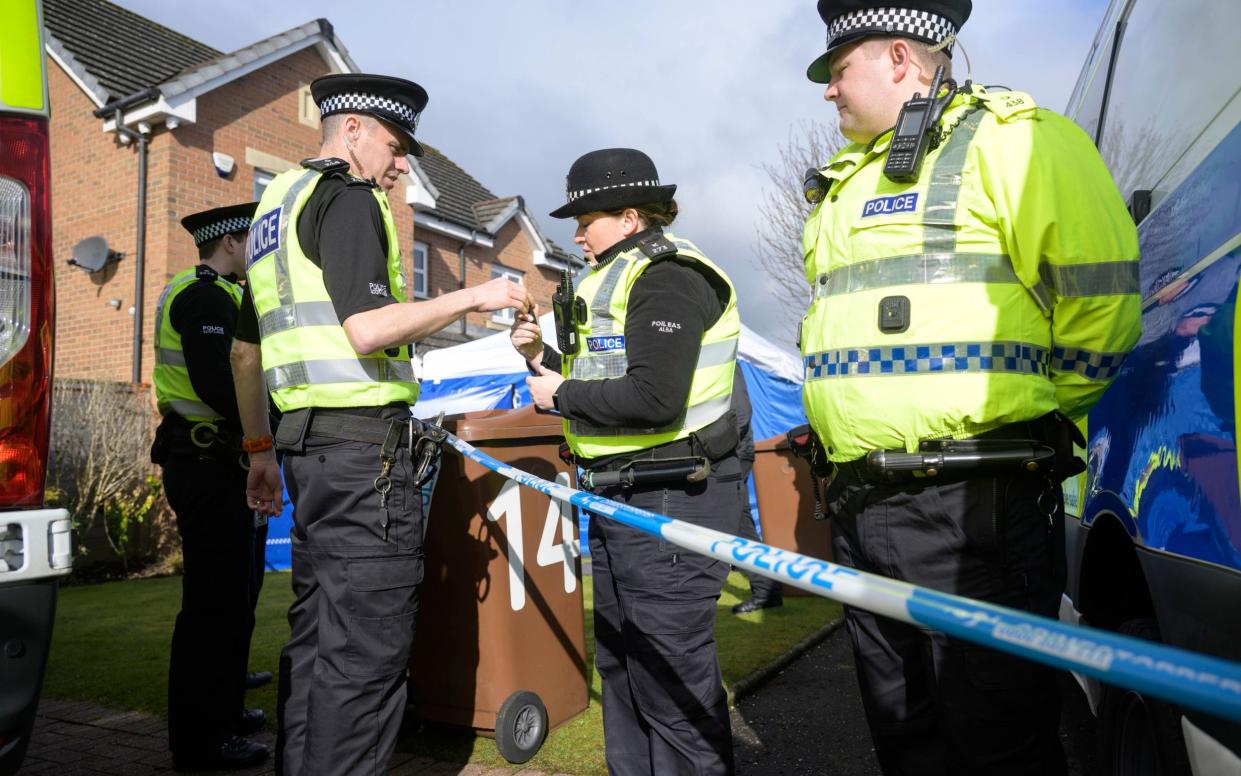 Police outside Peter Murrell and Nicola Sturgeon's house in Baillieston, east of Glasgow