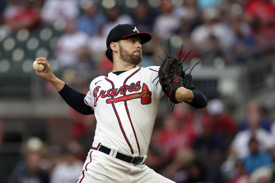 Atlanta Braves' Ian Anderson pitches against the Arizona Diamondbacks during the first inning of a baseball game Saturday, July 30, 2022, in Atlanta. (AP Photo/Butch Dill)