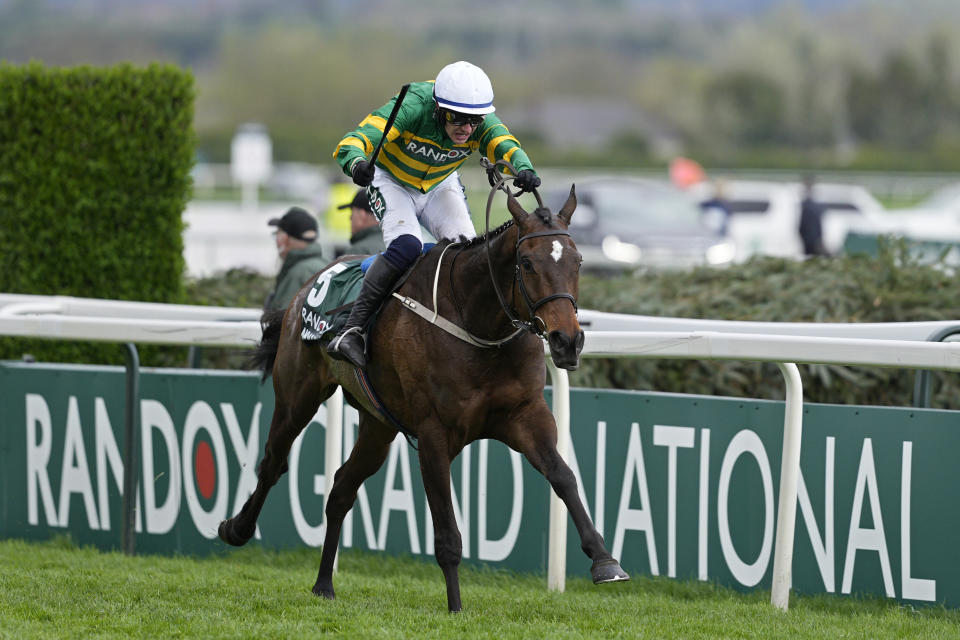 I Am Maximus, ridden by jockey P. Townend, runs to win the Randox Grand National Handicap Chase race on the third day of the Grand National Horse Racing meeting at Aintree racecourse, near Liverpool, England, Saturday, April 13, 2024. Organizers of Britain's biggest horse race have taken action to improve safety and avoid a repeat of the chaos sparked by animal-rights activists before last year's edition.(AP Photo/Dave Shopland)