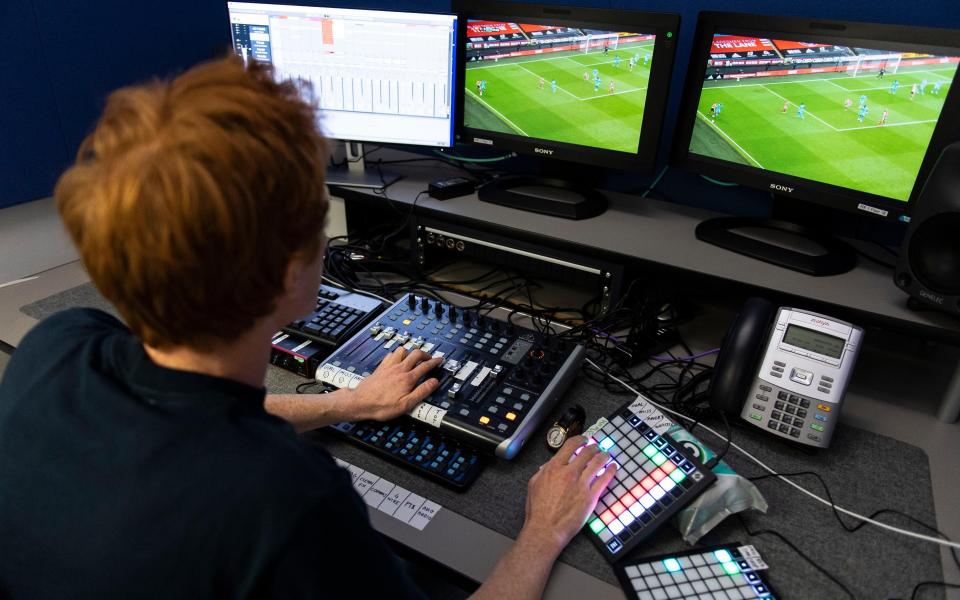 Man operates faders and MIDI controller while watching football - SKY SPORTS