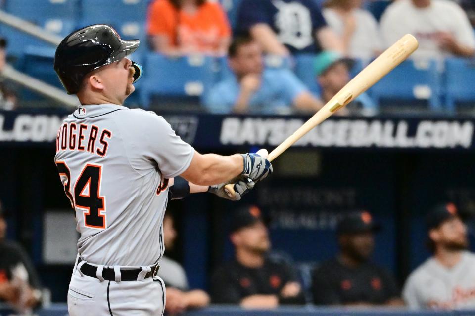 Tigers catcher Jake Rogers hits a home run in the ninth inning of the Tigers' 5-1 loss on Sunday, April 2, 2023, in St. Petersburg, Florida.