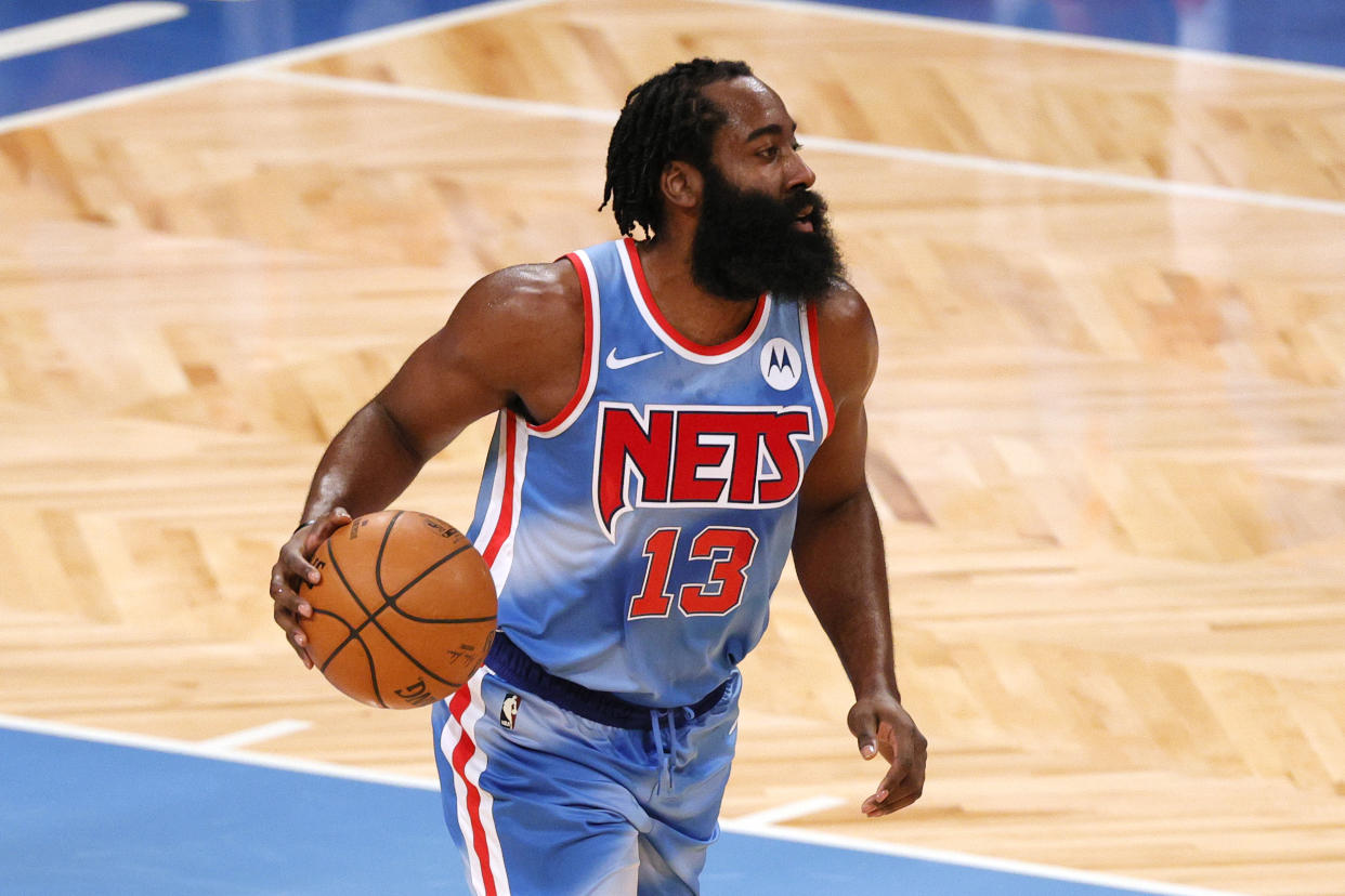 NEW YORK, NEW YORK - JANUARY 16: James Harden #13 of the Brooklyn Nets dribbles during the first half against the Orlando Magic at Barclays Center on January 16, 2021 in the Brooklyn borough of New York City. NOTE TO USER: User expressly acknowledges and agrees that, by downloading and or using this Photograph, user is consenting to the terms and conditions of the Getty Images License Agreement. (Photo by Sarah Stier/Getty Images)