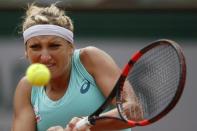 Tennis - French Open - Roland Garros - Eugenie Bouchard of Canada vs Timea Bacsinszky of Switzerland - Paris, France - 26/05/16. Timea Bacsinsky returns the ball. REUTERS/Pascal Rossignol