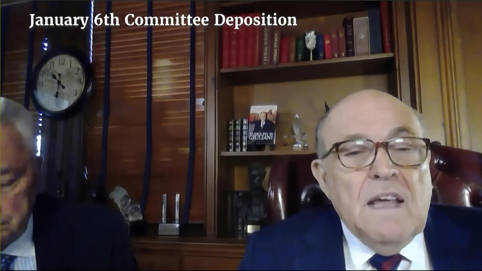 In this image from video released by the House Select Committee, Rudolph Giuliani speaks during a video deposition to the House select committee investigating the Jan. 6 attack on the U.S. Capitol, that was shown as an exhibit at the hearing Monday, June 13, 2022, on Capitol Hill in Washington. (House Select Committee via AP)