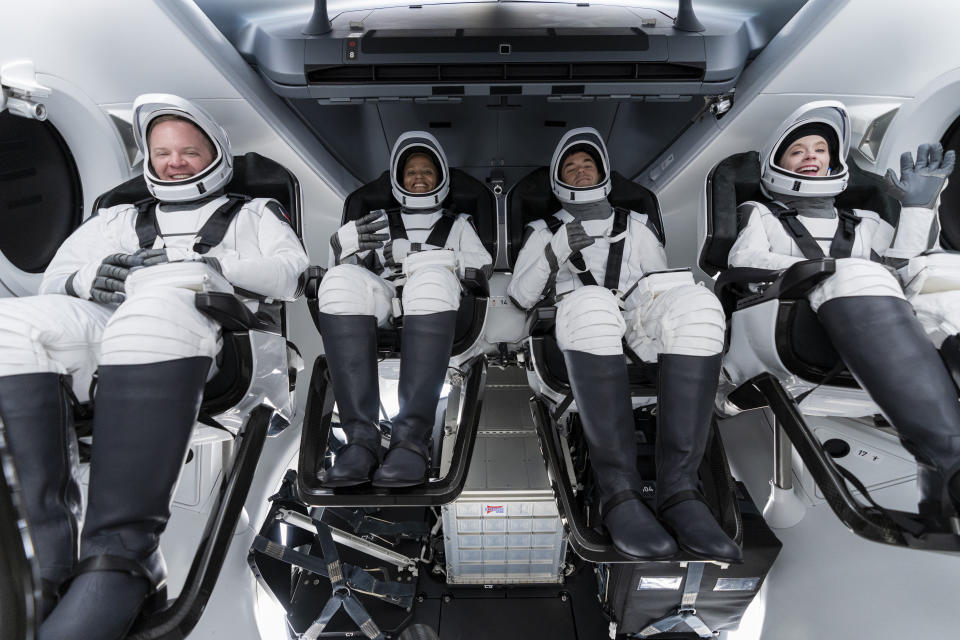 FILE - In this photo made available by SpaceX, from left, Chris Sembroski, Sian Proctor, Jared Isaacman and Hayley Arceneaux sit in the Dragon capsule at Cape Canaveral in Florida on Sunday, Sept. 12, 2021, during a dress rehearsal for the upcoming launch. Sembroski offered to take personal items into space for the original winner, Kyle Hippchen. Hippchen gathered his high school and college rings, airline captain epaulettes, a great-uncle’s Purple Heart, and odds and ends from his best friends from high school, warning, “Don’t ask any details.” (SpaceX via AP)