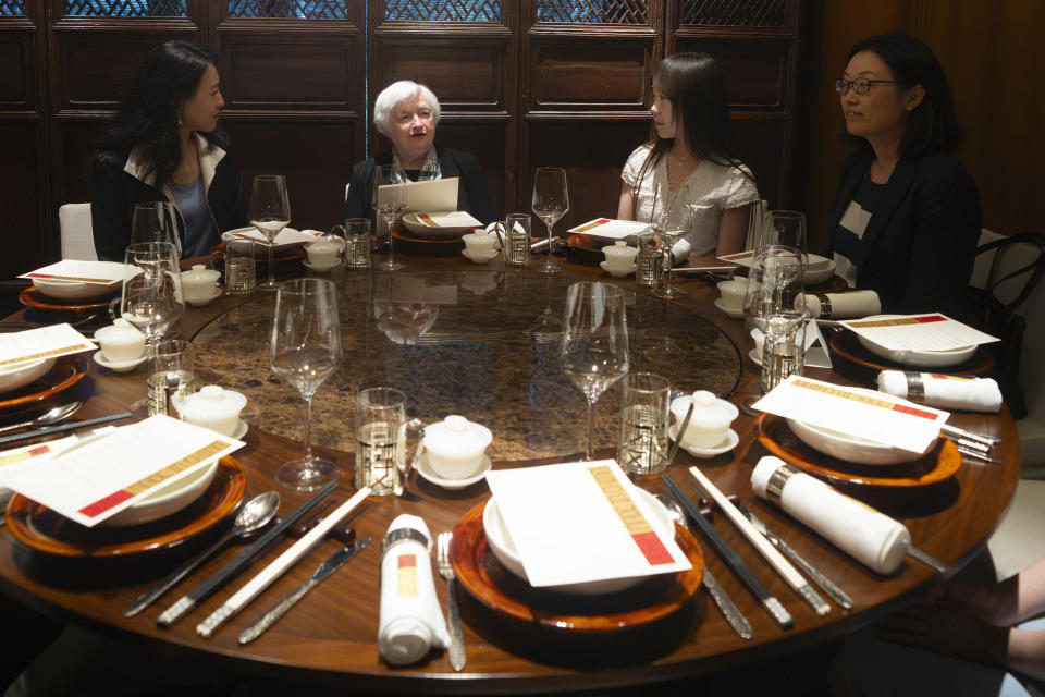 FILE - U.S. Treasury Secretary Janet Yellen, center, speaks, during a lunch meeting with women economists in Beijing, China, Saturday, July 8, 2023. Ever since she ate mushrooms that can have psychedelic effects in Beijing last July, Americans and Chinese have been united in their interest in what Janet Yellen will eat next. (AP Photo/Mark Schiefelbein, Pool, File)