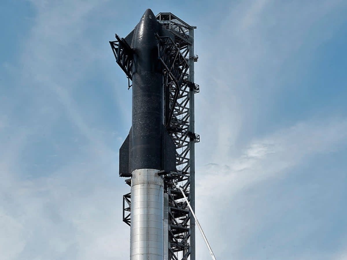 SpaceX’s first orbital Starship stacked atop its massive Super Heavy Booster at the company’s Starbase facility near Boca Chica Village in South Texas on 10 February, 2022 (Getty Images)