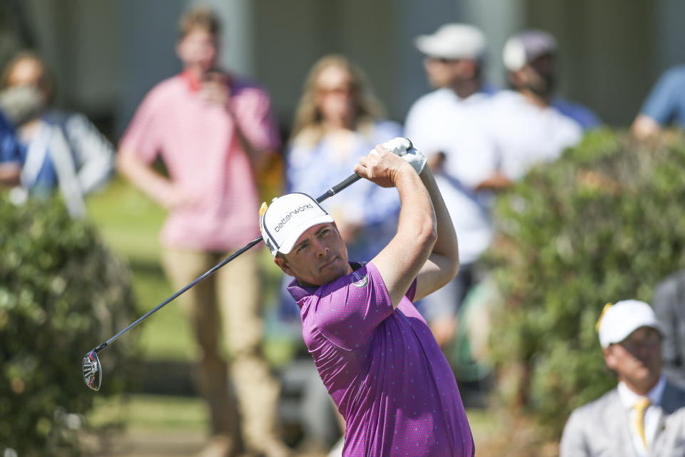 Luke List watches his shot from the first tee box during the final round of the Sanderson Farms Championship golf tournament in Jackson, Miss., Sunday, Oct. 8, 2023. (James Pugh/impact601.com via AP)