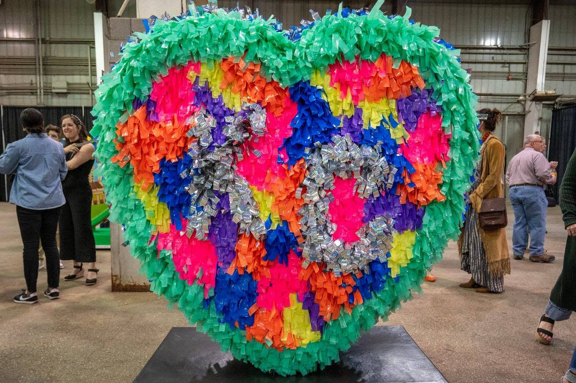 “Hearty Party” by artist Abigael Elliott is displayed during the Parade of Hearts reveal kickoff event at the American Royal Hale Arena on Friday, April 12, 2024, in Kansas City.