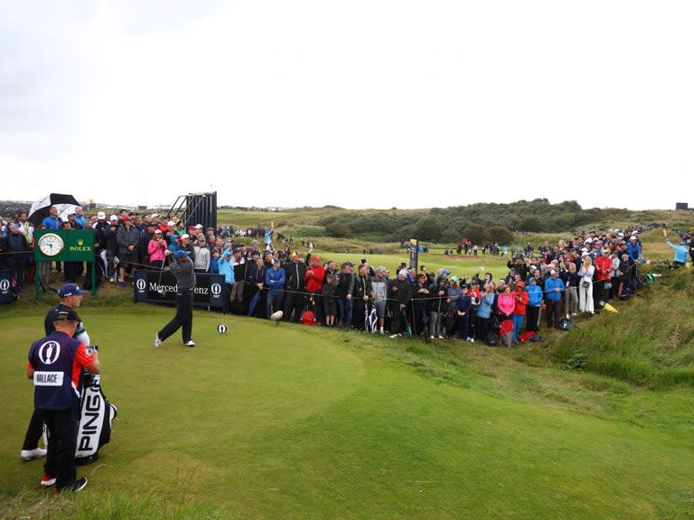 Rory McIlroy and Tiger Woods endured miserable first rounds at The Open on Thursday with American J.B. Holmes ending in the lead after shooting a five under-par 66 at Royal Portrush.McIlroy wilted in front of a home crowd, labouring to an eight-over-par 79, while a sore Woods was unrecognisable from the player who clinched victory at the Masters in April and finished on seven-over-par.Ireland’s Shane Lowry was the clubhouse leader for a couple of hours after a four-under-par 67 on a day of wind and squally showers, and lies just one shot back of Holmes.One further back, a huge pack including Brooks Koepka, Tommy Fleetwood and Jon Rahm remains well within contention.Here are Friday’s tee times in full:06:35 Joaquin Niemann (Chi), Tom Lehman (US), Miguel Angel Jimenez (Spa)06:46 Byeong-Hun An (Kor), Jorge Campillo (Spa), Chris Wood (Eng)06:57 Joel Dahmen (US), Adri Arnaus (Spa), Dimitrios Papadatos (Aus)07:08 Rory Sabbatini (Svk), Stewart Cink (US), Inn-choon Hwang (Kor)07:19 Erik Van Rooyen (SA), Kurt Kitayama (US), Jake McLeod (Aus)07:30 Shaun Norris (SA), Ryan Fox (NZ), Dong-kyu Jang (Kor)07:41 Keith Mitchell (US), Tyrrell Hatton (Eng), Thomas Pieters (Bel)07:52 Justin Thomas (US), Tommy Fleetwood (Eng), Thorbjorn Olesen (Den)08:03 Louis Oosthuizen (SA), Brooks Koepka (US), Shubhankar Sharma (Ind)08:14 Billy Horschel (US), Jazz Janewattananond (Tha), Aaron Wise (US)08:25 Jordan Spieth (US), Marc Leishman (Aus), Danny Willett (Eng)08:36 Cameron Smith (Aus), Adam Hadwin (Can), David Lipsky (US)08:47 Paul Lawrie (Sco), Chez Reavie (US), Justin Harding (SA)09:03 Tom Lewis (Eng), Takumi Kanaya (a) (Jpn), Brandon Stone (SA)09:14 Lucas Glover (US), Joost Luiten (Ned), Nino Bertasio (Ita)09:25 Ernie Els (SA), JB Holmes (US), Abraham Ancer (Mex)09:36 Lee Westwood (Eng), Brandt Snedeker (US), Brian Harman (US)09:47 Justin Rose (Eng), Tony Finau (US), Lucas Bjerregaard (Den)09:58 Jason Day (Aus), Dustin Johnson (US), Keegan Bradley (US)10:09 Matt Wallace (Eng), Tiger Woods (US), Patrick Reed (US)10:20 Jon Rahm (Spa), Patrick Cantlay (US), Matt Kuchar (US)10:31 Doc Redman (US), Kevin Streelman (US), Robert Rock (Eng)10:42 Adrian Otaegui (Spa), Yuta Ikeda (Jpn), Isidro Benitez (Mex)10:53 Patton Kizzire (US), Sang Hyun Park (Kor), Yuki Inamori (Jpn)11:04 Yoshinori Fujimoto (Jpn), Doyeob Mun (Kor), Andrew Wilson (Eng)11:15 Yosuke Asaji (Jpn), Gunn Charoenkul (Tha), Ashton Turner (Eng)11:36 James Sugrue (a) (Ire), Darren Clarke (NI), Charley Hoffman (US)11:47 Emiliano Grillo (Arg), Sung Kang (Kor), Thomas Thurloway (a) (Eng)11:58 Andy Sullivan (Eng), Christiaan Bezuidenhout (SA), Alexander Levy (Fra)12:09 Zander Lombard (SA), Chan Kim (US), Brandon Wu (a) (US)12:20 Richard Sterne (SA), Romain Langasque (Fra), Matthias Schmid (a) (Ger)12:31 Matthew Fitzpatrick (Eng), Padraig Harrington (Ire), Andrew Putnam (US)12:42 Eddie Pepperell (Eng), Bubba Watson (US), Rafael Cabrera-Bello (Spa)12:53 Phil Mickelson (US), Shane Lowry (Ire), Branden Grace (SA)13:04 Mike Lorenzo-Vera (Fra), Alex Noren (Swe), Sam Locke (Sco)13:15 Webb Simpson (US), Sergio Garcia (Spa), Cheng-Tsung Pan (Tai)13:26 Ryan Palmer (US), Andrea Pavan (Ita), Dylan Frittelli (SA)13:37 Kyle Stanley (US), Robert Macintyre (Sco), Andrew Johnston (Eng)13:48 Oliver Wilson (Eng), Mikko Korhonen (Fin), Curtis Knipes (a) (Eng)14:04 Sungjae Im (Kor), Ian Poulter (Eng), Kiradech Aphibarnrat (Tha)14:15 Henrik Stenson (Swe), Xander Schauffele (US), Graeme McDowell (NI)14:26 Russell Knox (Sco), Haotong Li (Chn), Bernd Wiesberger (Aut)14:37 Jason Kokrak (US), Connor Syme (Sco), Austin Connelly (Can)14:48 Zach Johnson (US), David Duval (US), Corey Conners (Can)14:59 Francesco Molinari (Ita), Bryson DeChambeau (US), Adam Scott (Aus)15:10 Rory McIlroy (NI), Gary Woodland (US), Paul Casey (Eng)15:21 Kevin Kisner (US), Rickie Fowler (US), Hideki Matsuyama (Jpn)15:32 Jim Furyk (US), Si Woo Kim (Kor), Jimmy Walker (US)15:43 Alexander Bjork (Swe), Luke List (US), Paul Waring (Eng)15:54 Shugo Imahira (Jpn), Nate Lashley (US), Benjamin Hebert (Fra)16:05 Mikumu Horikawa (Jpn), Callum Shinkwin (Eng), Garrick Porteous (Eng)16:16 Prom Meesawat (Tha), Matthew Baldwin (Eng), Jack Senior (Eng)