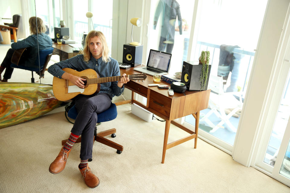 This March 11, 2014 photo shows musician Aaron Bruno of Awolnation in Malibu, Calif. Awolnation’s haunting song, “Sail,” has sold 5 million tracks and the sleeper hit is the second longest running song on the Billboard Hot 100 chart with 79 weeks. The band is currently working on the follow-up to their gold-selling 2011 debut, “Megalithic Symphony.”(Photo by Matt Sayles/Invision/AP)