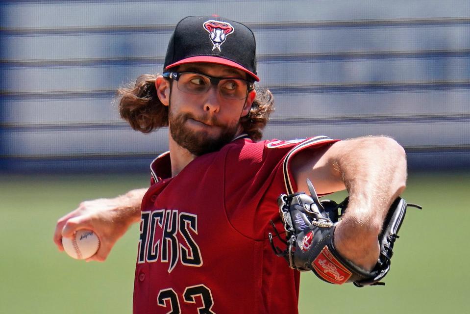 Arizona Diamondbacks starting pitcher Zac Gallen delivers during the first inning of a baseball game against the Pittsburgh Pirates in Pittsburgh, Sunday, June 5, 2022. (AP Photo/Gene J. Puskar)