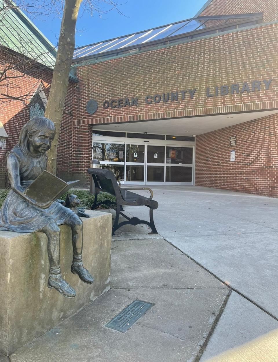 A bronze statue in memory of former local child Virginia Tross Harvey at the Toms River branch of the Ocean County Library.