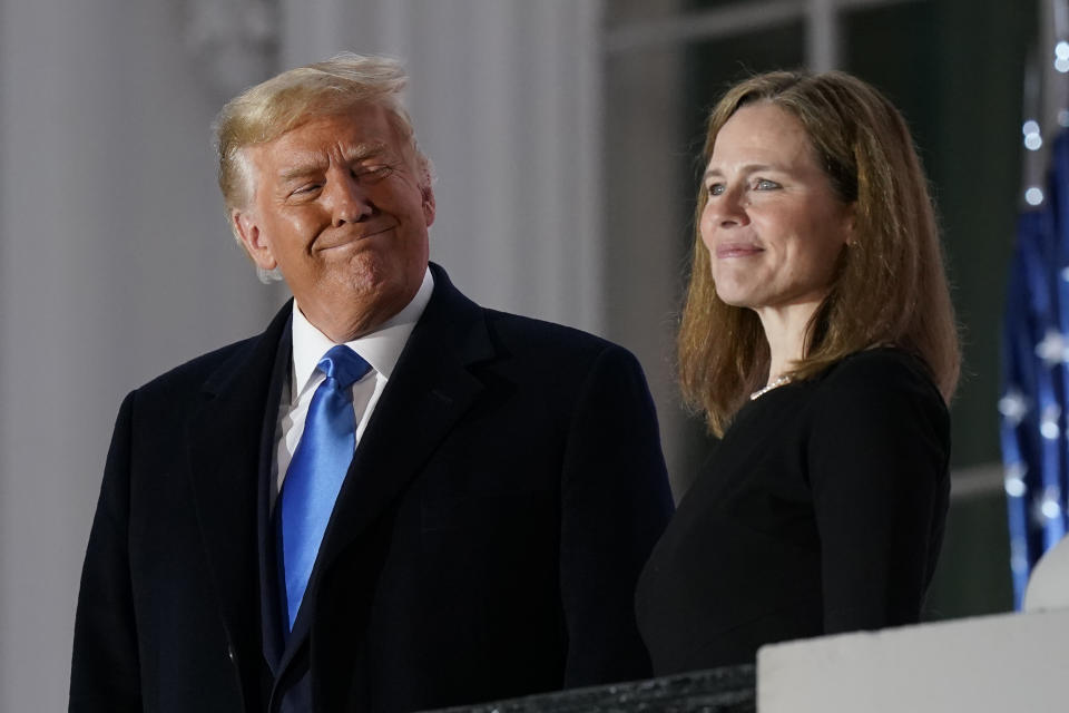 Donald Trump y Amy Coney Barrett (AP Photo/Patrick Semansky)