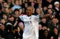 <p>Former Fulham striker, 5ft 11in, Dutchman. </p>