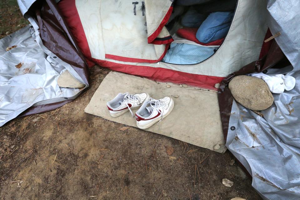 Tami and Jeff Sandler always take their shoes off outside their tent and then bring them inside so they won't get any dirt in their home of 10 months.