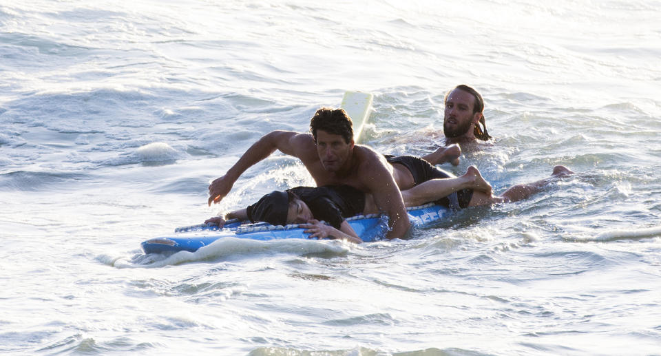 The woman was caught under 10ft waves at Bronte Beach before being saved by Bondi Rescue Lifeguards