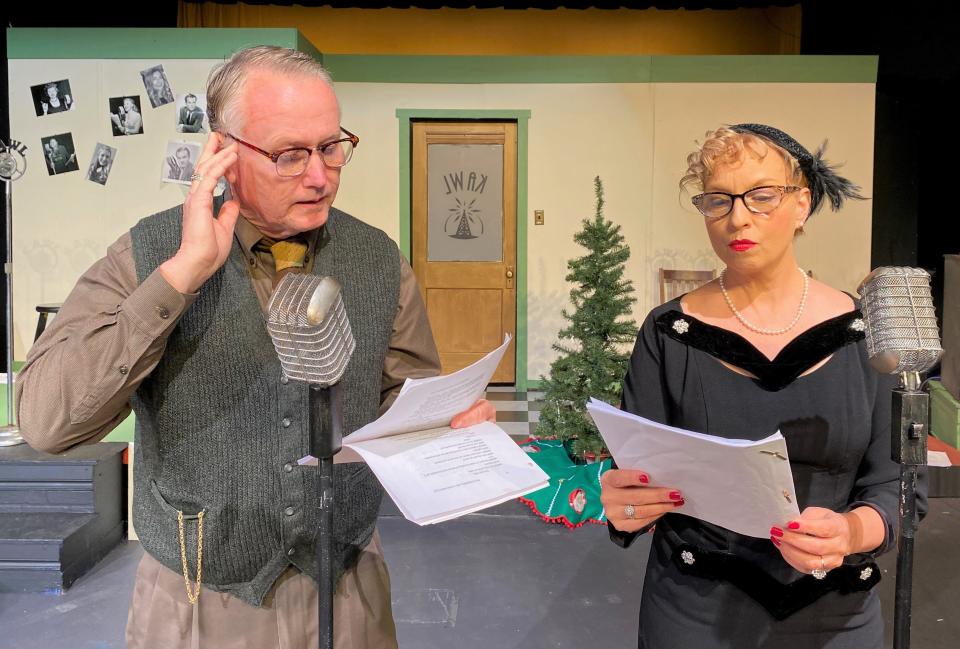 Fading 1940's Hollywood personalities Royce Thompson and Kim Hanigar read their parts during a live broadcast in SLT's "It's A Wonderful Life: A KAWL Radio Play."
