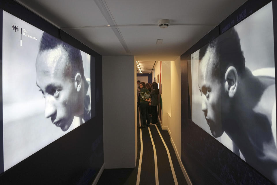 American track and field athlete Jesse Owens, who won four gold medals at the 1936 Olympic Games in Berlin, is photographed during an exhibition press day, Wednesday, March 27, 2024 in Paris. Ahead of this summer's Paris Olympics, an exhibit in the French capital shows how the Games have been a "mirror of society" since the beginning of the 20th century. (AP Photo/Laurent Cipriani)