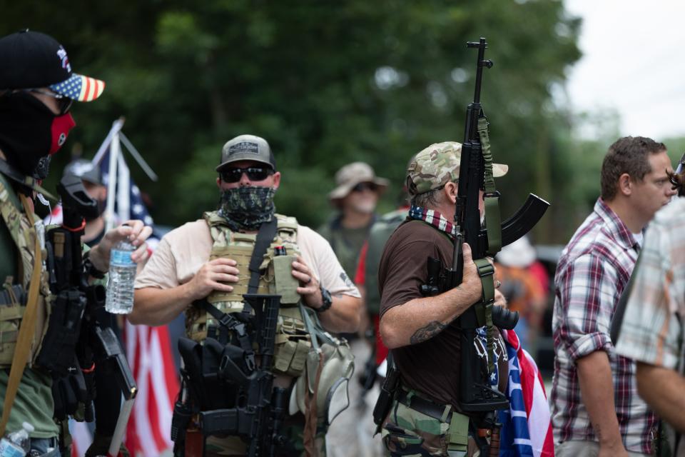 Armed members of far-right militias and white pride organizations